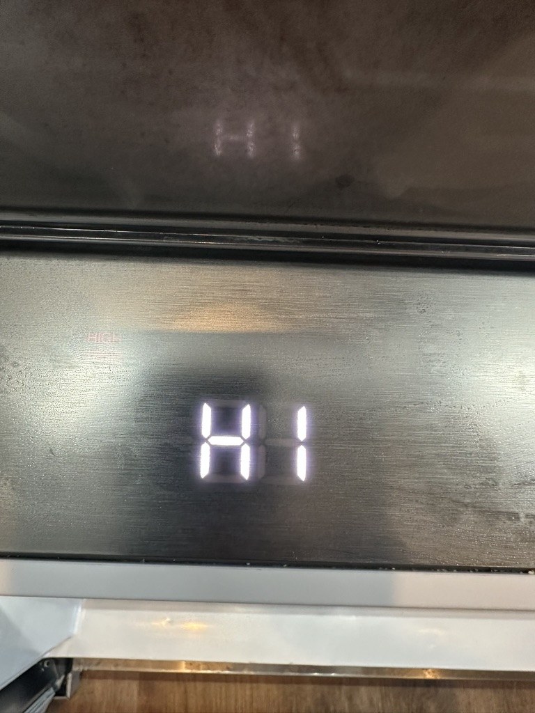 Frigidaire freezer control display showing a HI high-temperature alarm