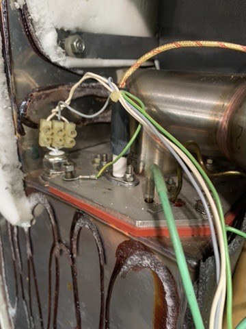 Steam boiler heating element and wiring inside a Rational combi oven during repair