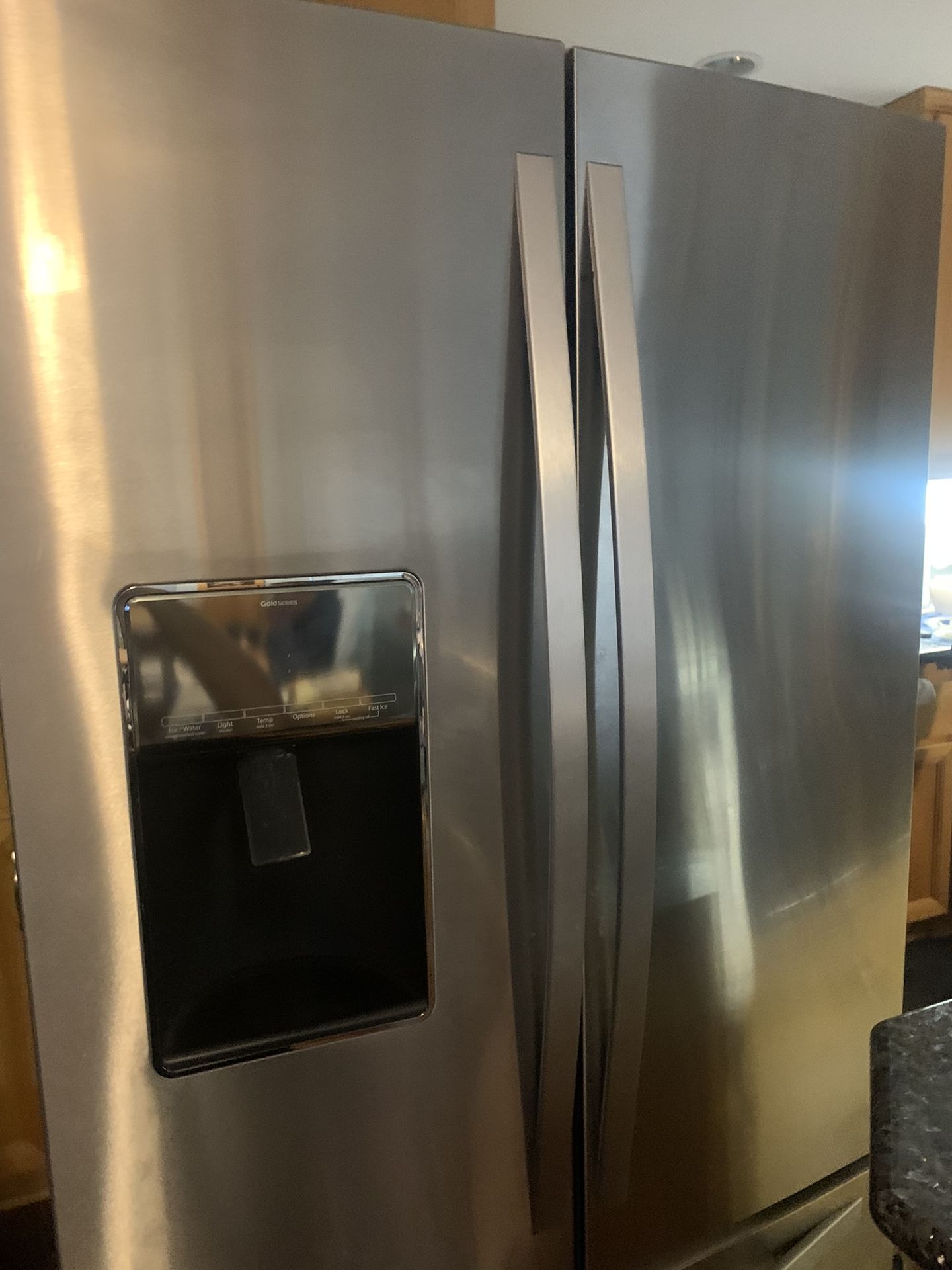 Whirlpool Gold Series side-by-side refrigerator, front view